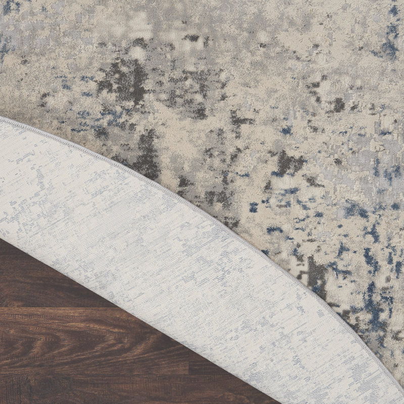 Tapis moderne ivoire, Rond 7 pi 10 po