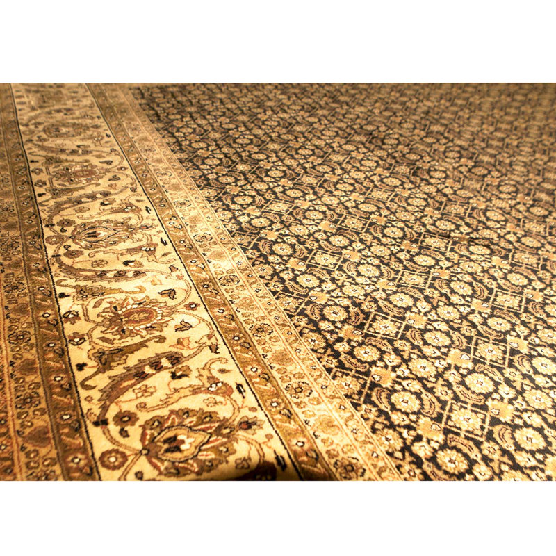 Tapis noir et doré de haute qualité noué à la main
