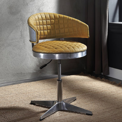 - Tabouret avec siège en cuir de curcuma et base pivotante