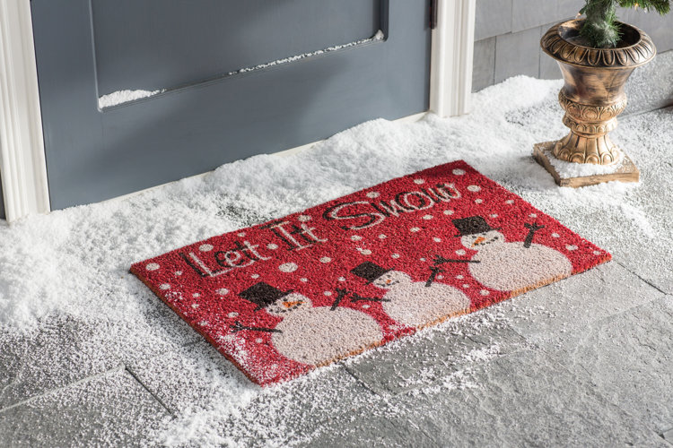 Holiday-themed doormat.