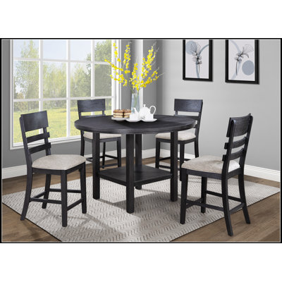 Table de salle à manger ronde blanche et chromée au design épuré pour les cuisines modernes et les espaces compacts