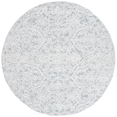 Tapis bleu clair / ivoire en polyester touffeté à la main Peterec