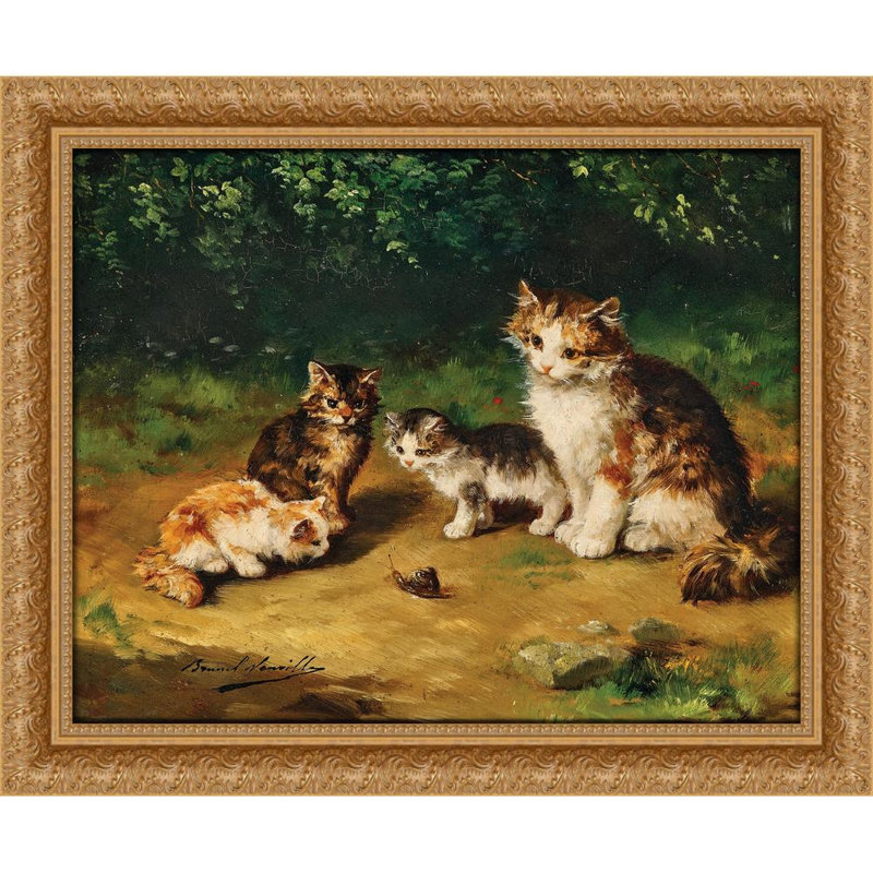 Curious kittens with snail