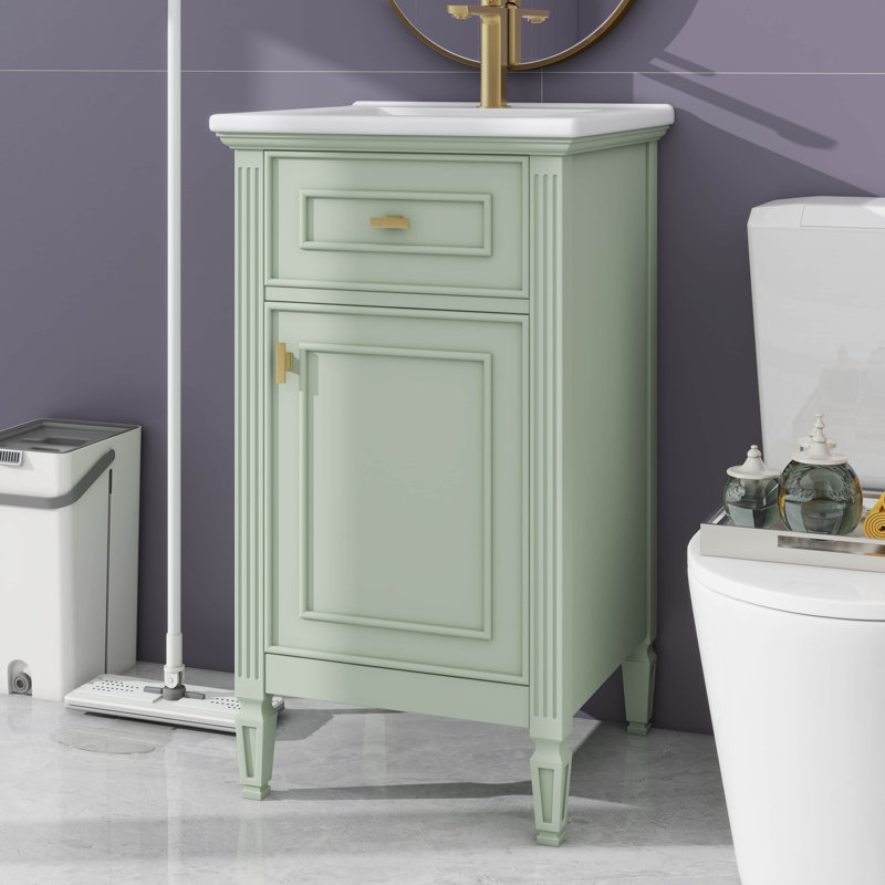L'ensemble de meuble-lavabo de salle de bain élégant de 20 pouces est livré avec un tiroir inclinable, une tablette polyvalente et un support de rangement
