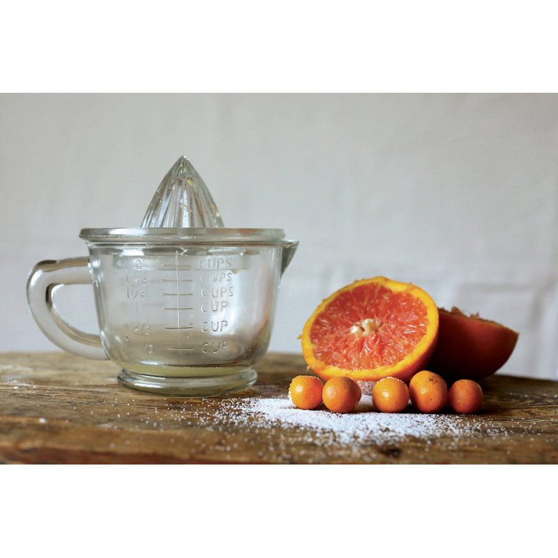 Presse-agrumes en verre pressé avec tasse à mesurer