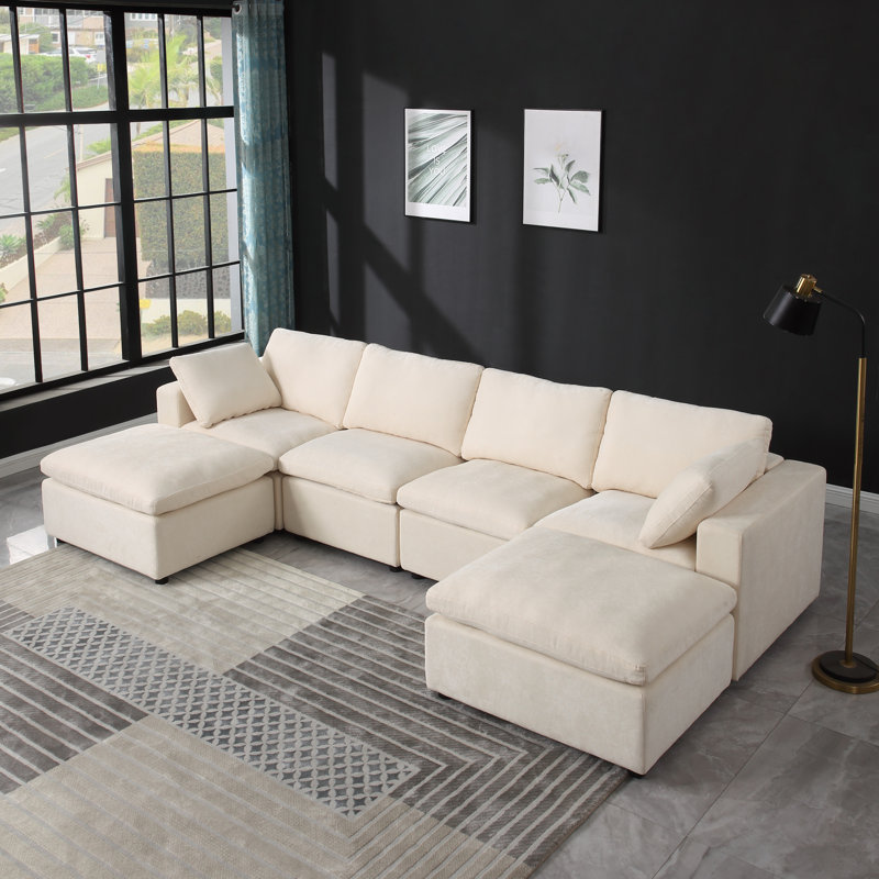 Canapé convertible modulaire avec repose-pieds, confort en tissu, style beige moderne pour les salons