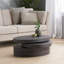 Table basse tournante ovale en panneau de fibres à densité moyenne de couleur noire pour les espaces de vie modernes, conception contemporaine à profil bas