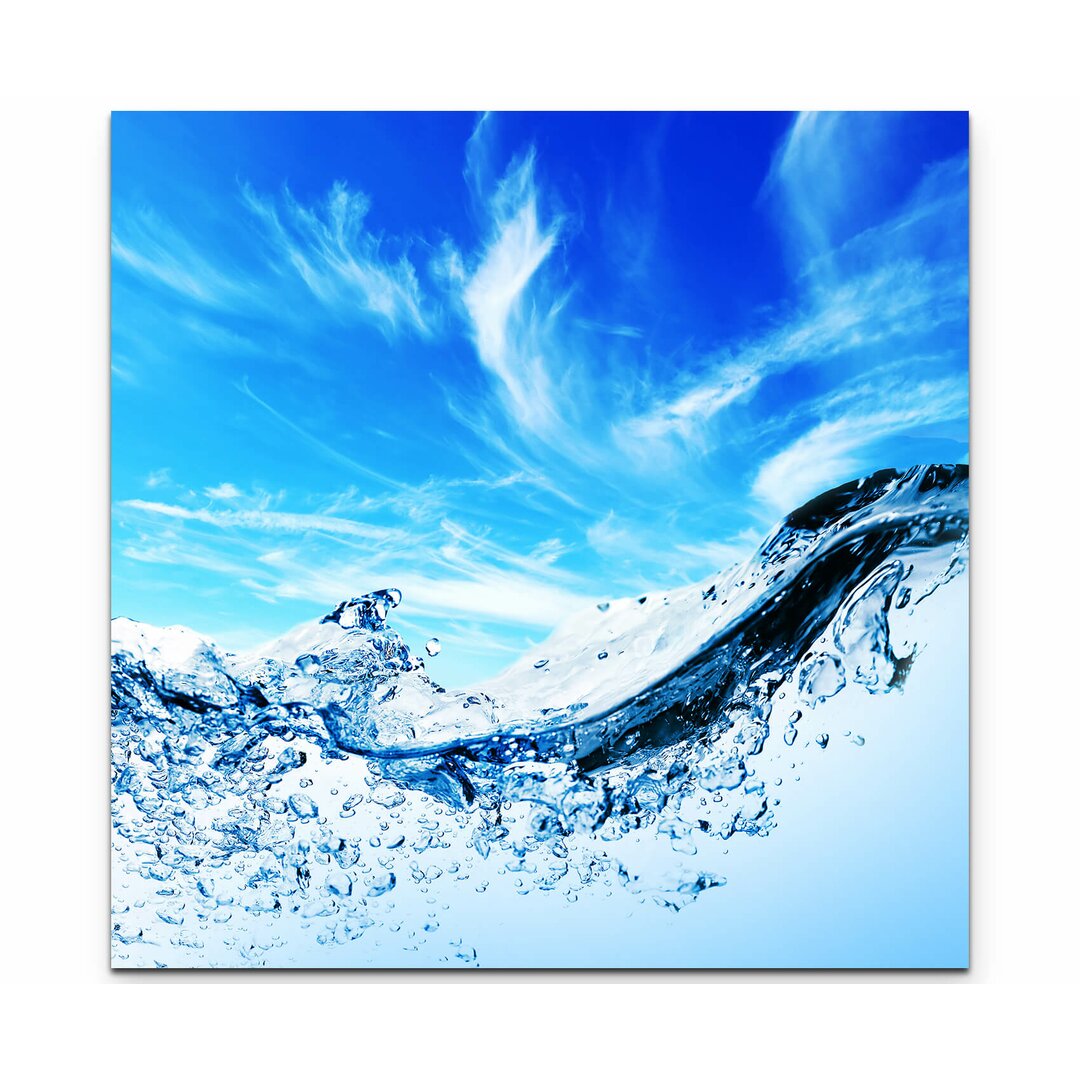 Leinwandbild Wasserblasen unter blauem Himmel