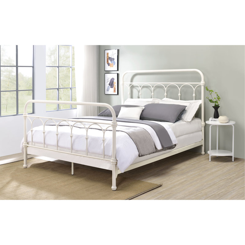 Lit à finition blanche, support en métal pour un cadre de sommeil reposant avec décoration gracieuse