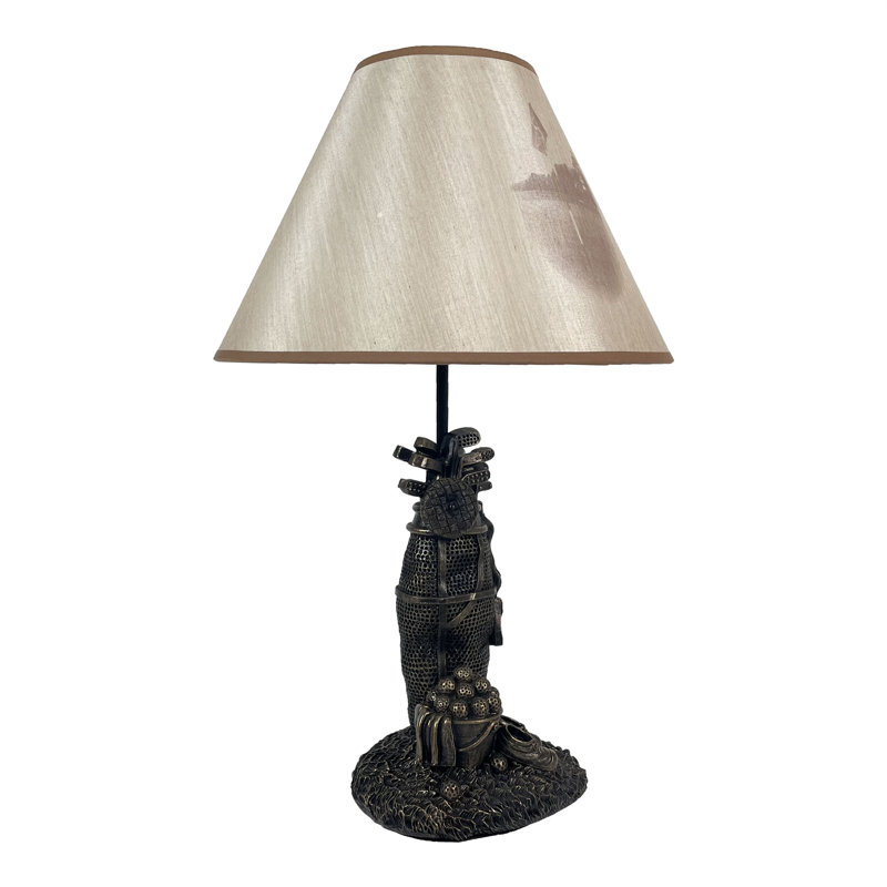 Coolmaghra Eclectic golf bag resin table lamp with antique bronze finish, beige fabric shade, Type A bulb — 20 inches high