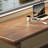 A simple rectangular solid wood desk in walnut color-2030258268