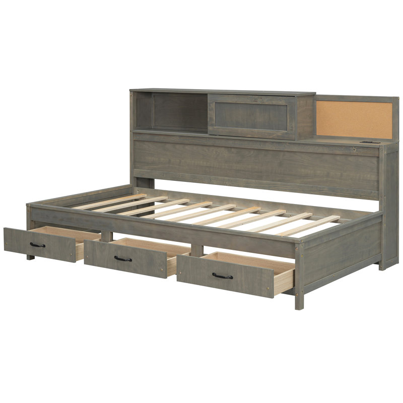 Lit de jour gris en bois simple avec 3 tiroirs coulissants, tête de lit souple et douilles intégrées pour une tablette de rangement cachée de taille confortable, options de chargement