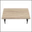 Table basse rectangulaire moderne avec finition taupe foncé et pieds en métal inclinés, idéale pour les petits espaces de vie.