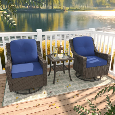 2-Piece Swivel Chair Set with Cushions & Glass Coffee Table – Iron Frame, Weather-Resistant Rattan. by Winston Porter