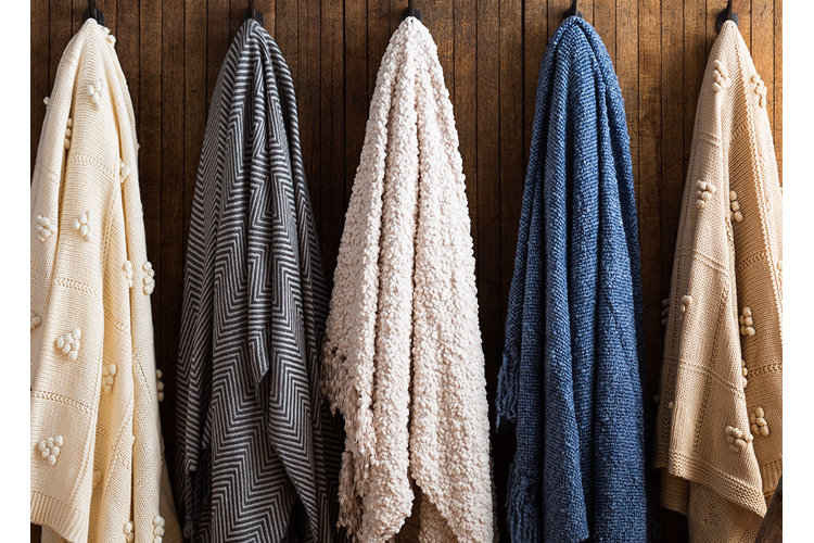 Hanging sweater knit throws