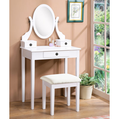 Coiffeuse et tabouret en bois blanc avec 3 espaces de rangement et miroir réglable, composé de compartiments.