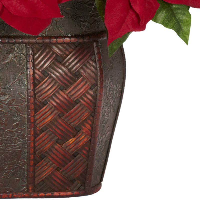 Arrangement floral poinsettia dans un vase