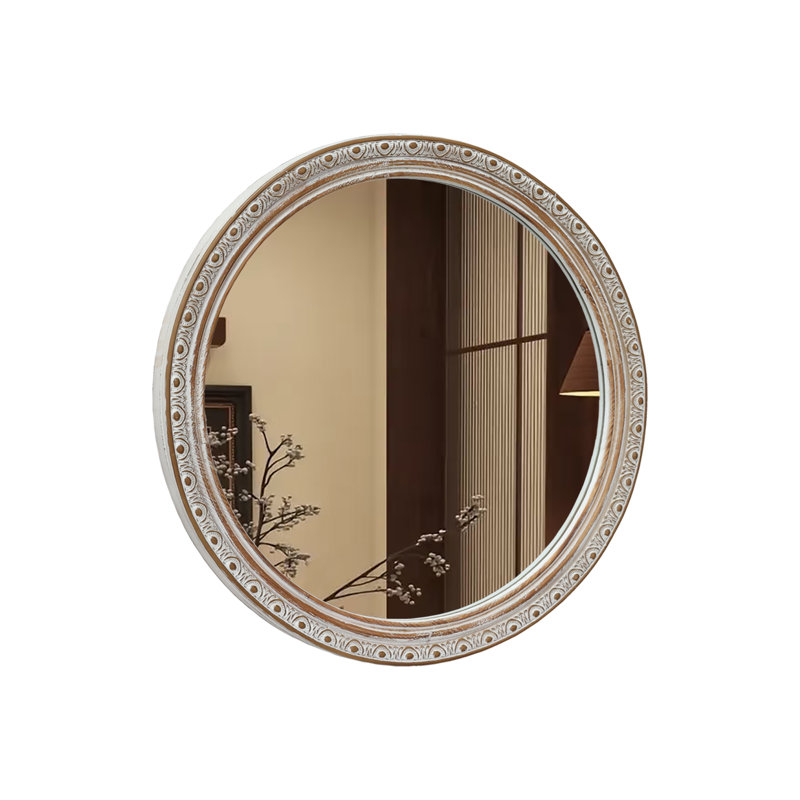 Miroir mural rond avec cadre sculpté