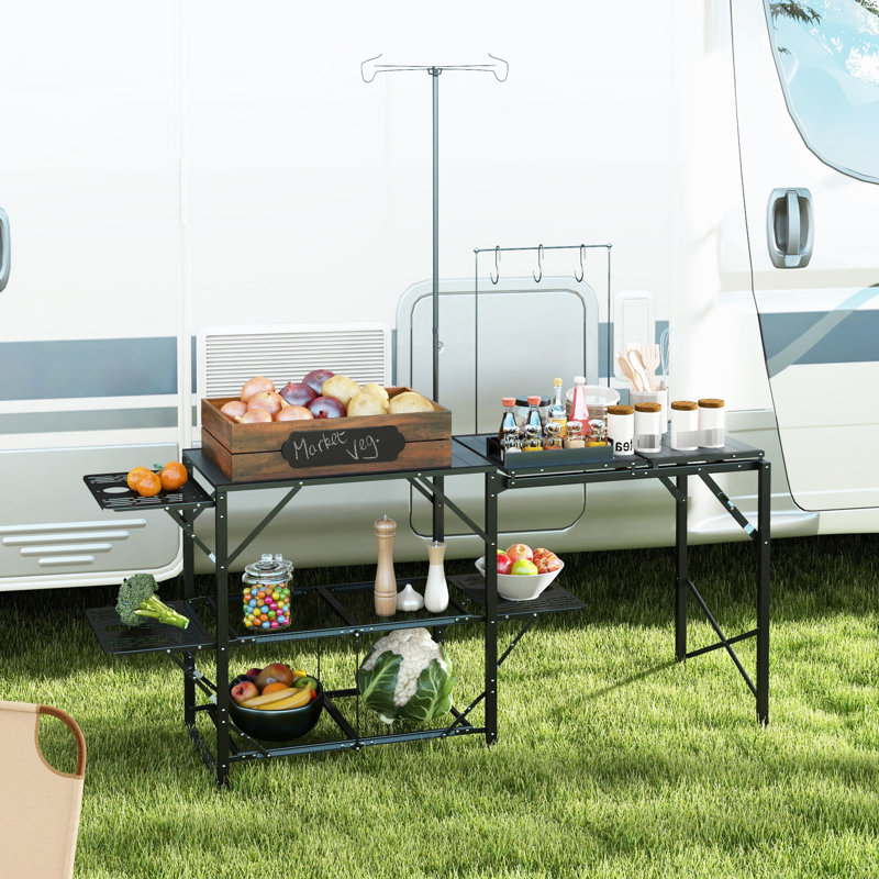 Table de camping portative avec espace de rangement, support de lanterne réglable et suspensions pratiques