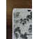 Azariah Floral Machine Made Polyester Area Rug in Gray/Black/Green