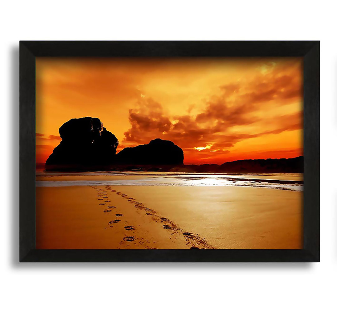 Gerahmtes Wandbild Footprints In The Orange Ocean Sand