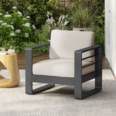 Outdoor Club Chair With Weather-Resistant Aluminum Frame And Plush Cushion For All-Season Comfort.