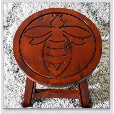 Carved Wooden Step Stool With Whimsical Designs And Durable Construction, Perfect For Home Use And Decor.
