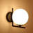 Estevanell 1-Light Metal Wall Sconce With Frosted Glass Shade-3394292