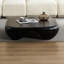 Table basse moderne en faux travertin texturé pour le salon / bureau-851984472