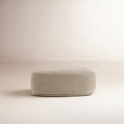 Adna 44'' Triangular Upholstered Ottoman
