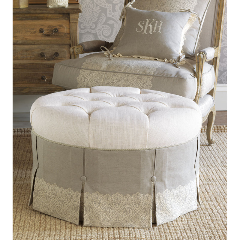 Beige Tufted Round Ottoman with Nailhead Trim
