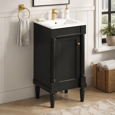 Meuble-lavabo de style français de 45,7 cm (18 po) avec lavabo en céramique, design à colonnes semi-circulaires, charnières à fermeture douce, tablette réglable et panneau arrière ouvert.