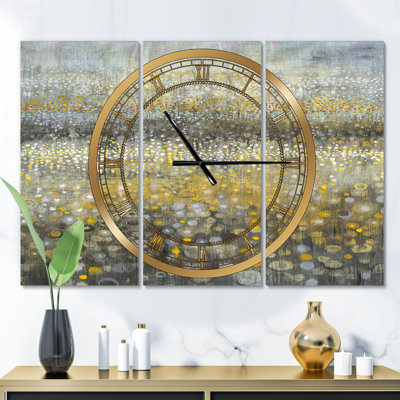 Horloge murale surdimensionnée en métal à 3 panneaux de 28 po glam Galm