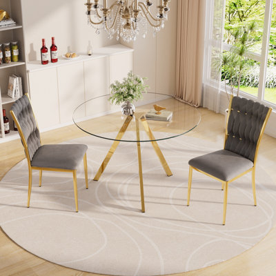 Ensemble de table de salle à manger en verre avec chaises rembourrées en velours