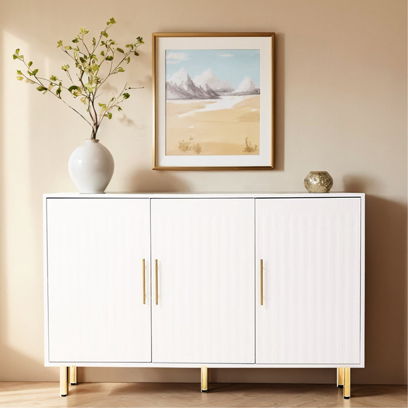 53.7" W White Buffet Cabinet. 3 Doors With Gold Handles. For Various Rooms. Fluted Door Appeal 3-Door Cabinet In White. Handles And Doors. Ideal For Styles. Fits Living, Dining, Kitchen