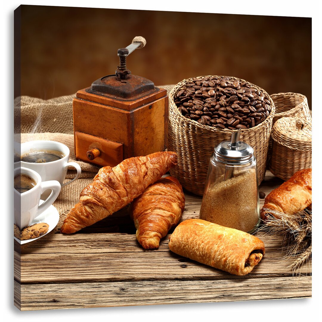 Leinwandbild Aromatischer Kaffee mit Croissant