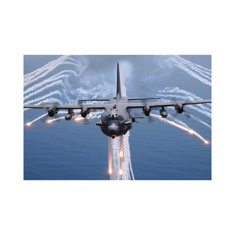 An AC-130H Gunship Aircraft Jettisons Flares As An Infrared Countermeasure by Stocktrek Images - Wrapped Canvas Print