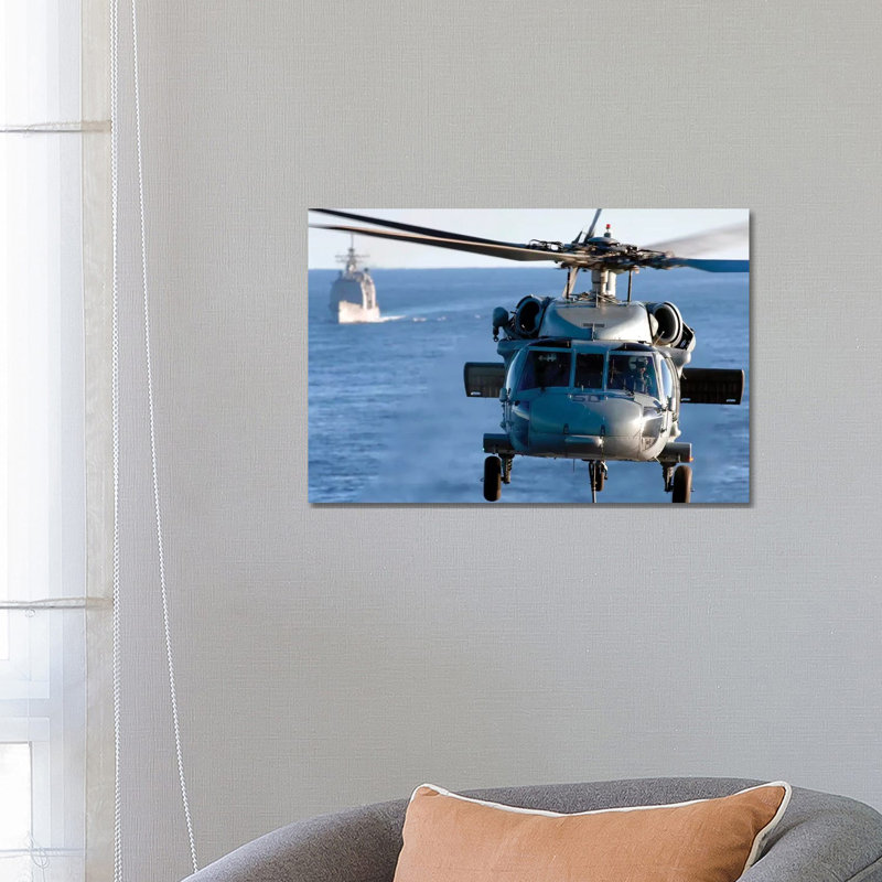 An MH-60S Seahawk Helps Conduct a Vertical Replenishment 1 Piece Wrapped Canvas Wall Art, 66.04 cm H x 45.72 cm W x 1.91 cm D
