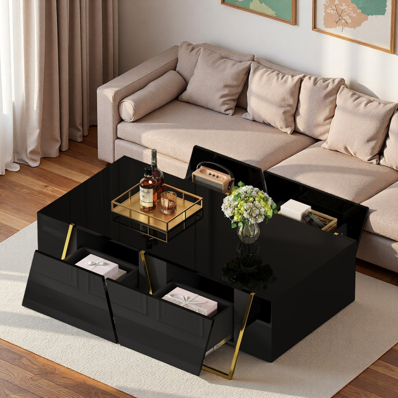 Table basse moderne moderne avec 4 tiroirs, base dorée et surface noire ultrabrillante