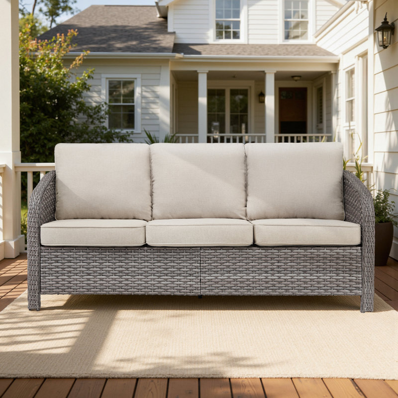 Arcola All-Weather Wicker Patio Enveloping Backrest Sofa With Cushions