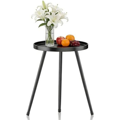 Petite table d'appoint ronde en métal noir, de style milieu du siècle, idéale pour une chambre, un salon ou un bureau.