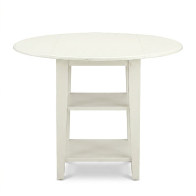 Ensemble de salle à manger rond 5 pièces en bois d'hévéa massif blanc lin avec 4 chaises à dossier à lattes, siège rembourré et deux rallonges rabattables.