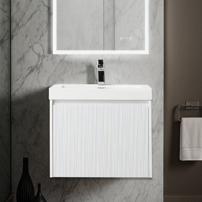 Meuble-lavabo flottant avec lavabo mural en bois avec dessus en acrylique, façade cannelée, porte à fermeture en douceur et rangement moderne Luziano