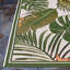 Tapis d'intérieur / extérieur ivoire / vert forêt à motif floral Mayshar-23586076