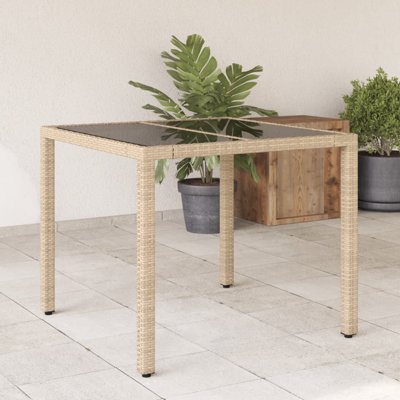 Table de patio avec plateau en verre