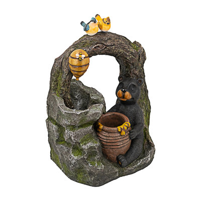 Fontaine à deux niveaux avec motif animalier des bois