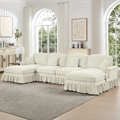 Canapé modulaire classique en U à 4 places avec accoudoirs évasés, jupes plissées à volants et pieds fuselés, canapé en nuage à assise profonde en chenille avec repose-pieds mobiles, beige 