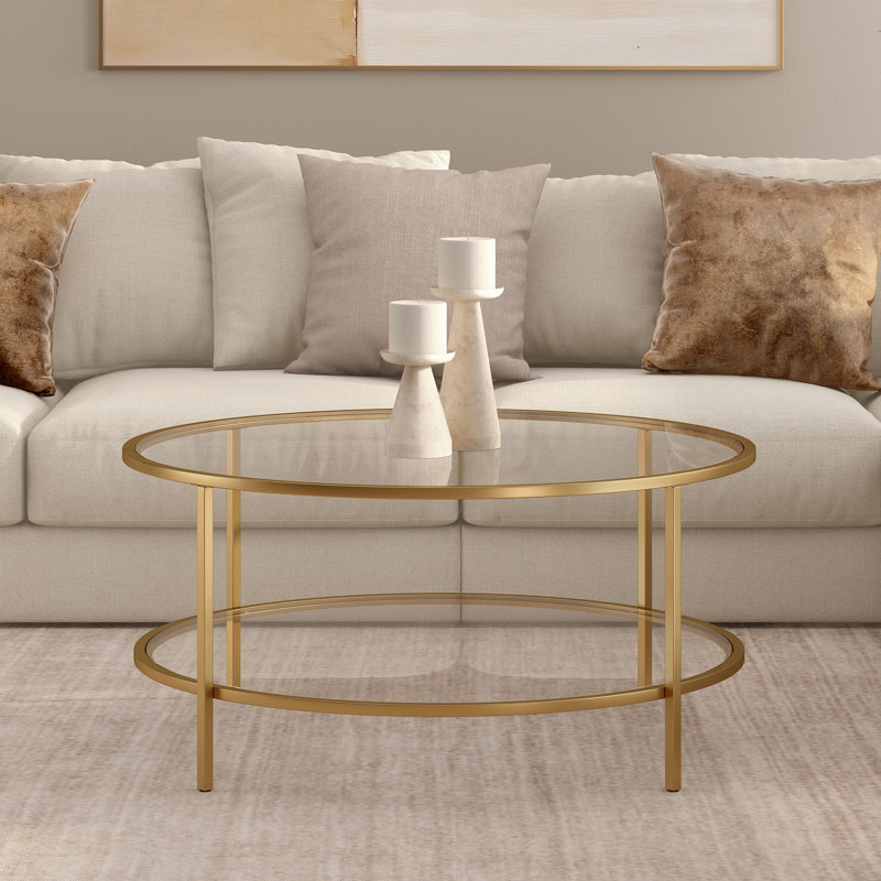 Gibbs Sivil 36" Wide Round Coffee Table with Glass Top in Brass, Gold