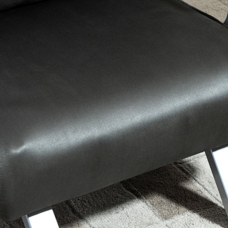 Fauteuil-lit ajustable à 5 positions, gris foncé avec coussin et structure en acier près du lit dans une structure robuste