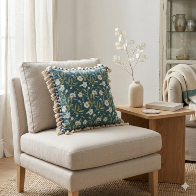 Coussin décoratif à imprimé floral de 50 x 50 cm avec rembourrage et pompons